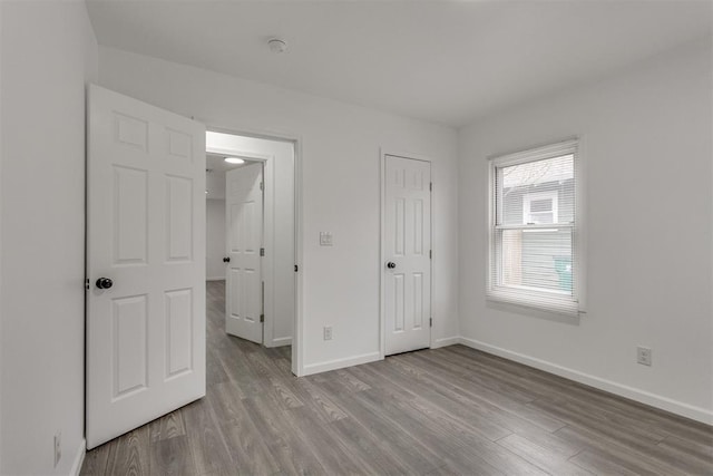 1617 NW 31st St, Oklahoma City, OK 73118 - unfurnished bedroom featuring light hardwood / wood-style floors and a closet