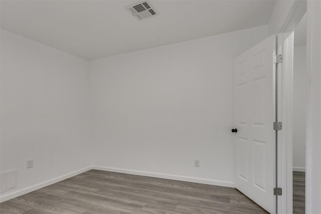 1617 NW 31st St, Oklahoma City, OK 73118 - unfurnished room with hardwood / wood-style floors
