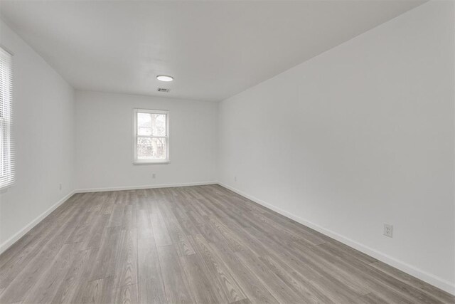 1617 NW 31st St, Oklahoma City, OK 73118 - spare room featuring light hardwood / wood-style flooring