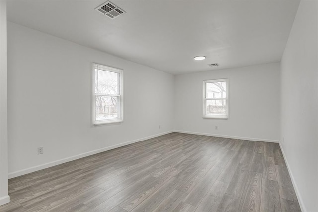 1617 NW 31st St, Oklahoma City, OK 73118 - spare room featuring light hardwood / wood-style floors