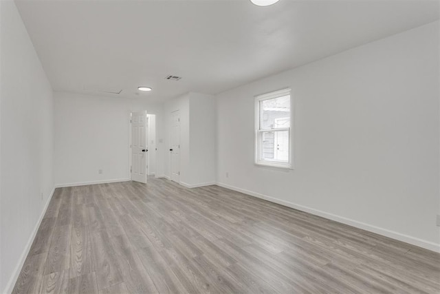 1617 NW 31st St, Oklahoma City, OK 73118 - unfurnished room featuring light wood-type flooring