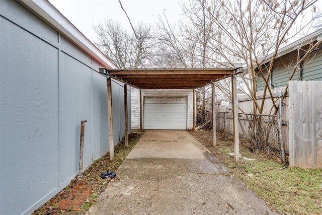 1617 NW 31st St, Oklahoma City, OK 73118 - exterior space featuring a carport and a garage