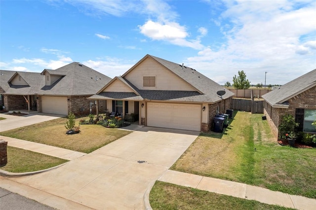 craftsman-style home with a garage and a front lawn