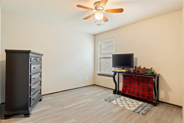 interior space featuring ceiling fan and light hardwood / wood-style floors