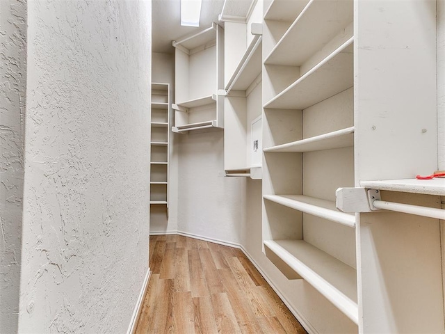 2508 Hamden Ave, Norman, OK 73069 - walk in closet with wood finished floors