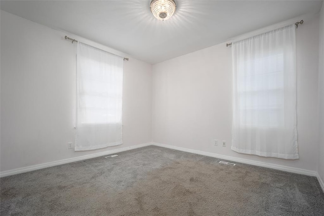 empty room featuring carpet