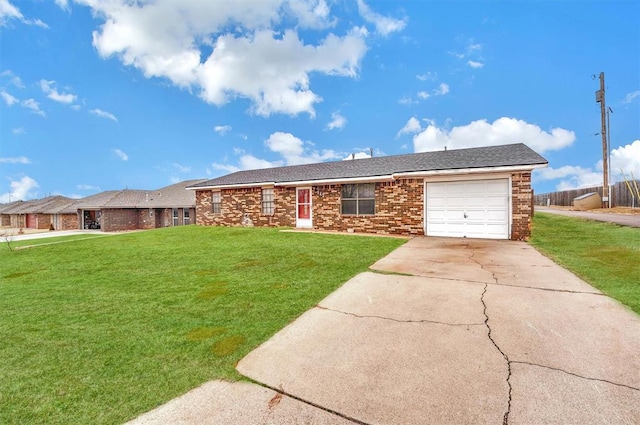 ranch-style house with a garage and a front lawn