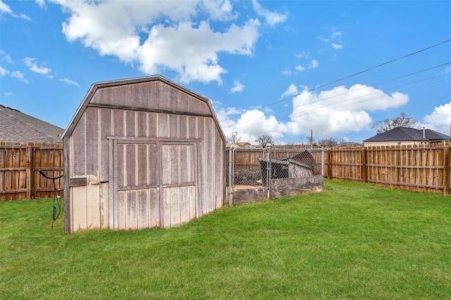 view of outdoor structure with a lawn