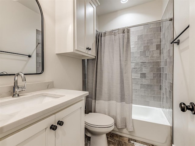 bathroom with toilet, shower / bath combo, and vanity