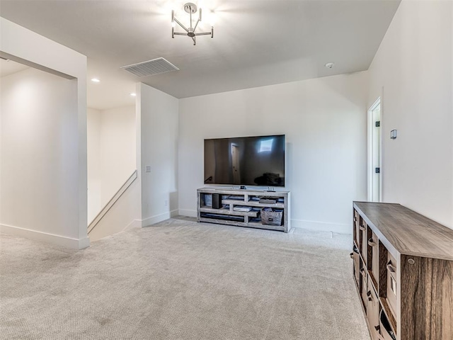 living area with light colored carpet, visible vents, baseboards, and recessed lighting