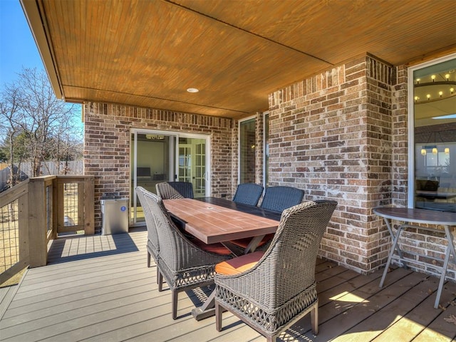 deck with outdoor dining space