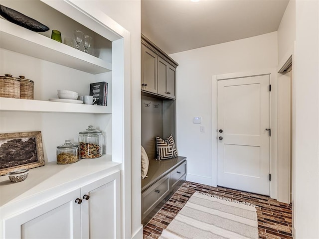 7308 Sunset Sail Ave, Edmond, OK 73034 - mudroom featuring brick floor