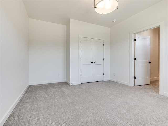 7308 Sunset Sail Ave, Edmond, OK 73034 - unfurnished bedroom with baseboards, carpet, and a closet