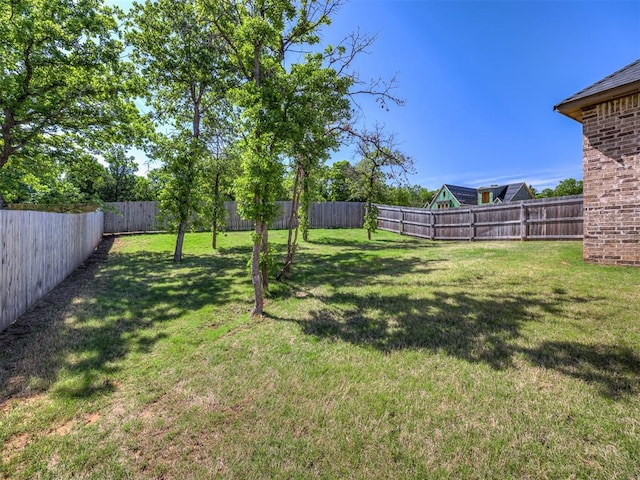 7308 Sunset Sail Ave, Edmond, OK 73034 - view of yard with a fenced backyard
