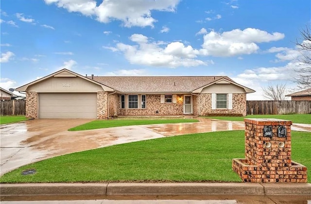 ranch-style house with a garage and a front lawn