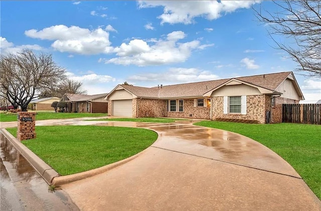 ranch-style house with a garage and a front lawn