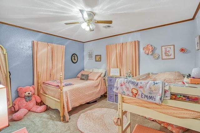 bedroom with ornamental molding, carpet, and ceiling fan