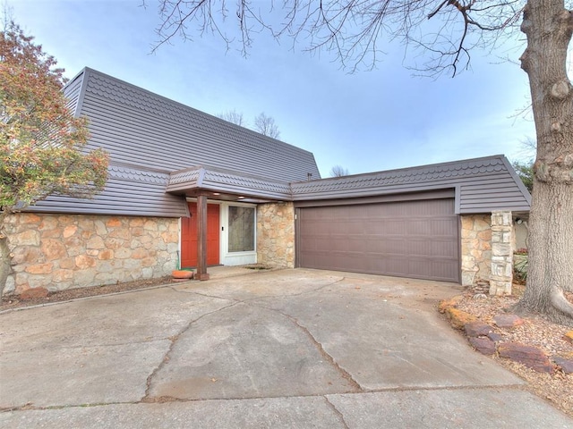 view of front of property with a garage