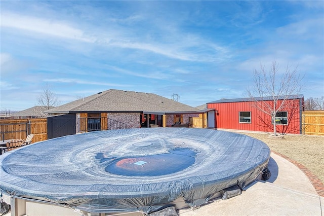 exterior space featuring an outbuilding