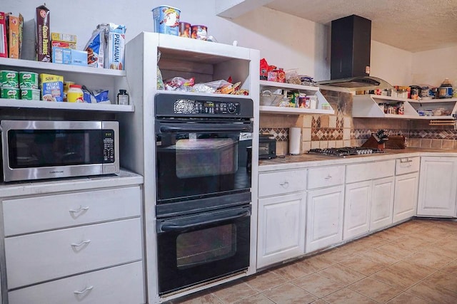 kitchen featuring range hood, open shelves, stainless steel appliances, decorative backsplash, and white cabinetry