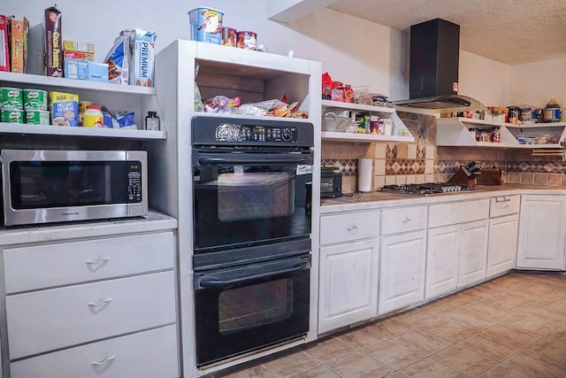 114 N Rambo St, Dill City, OK 73641 - kitchen featuring appliances with stainless steel finishes, open shelves, extractor fan, white cabinets, and a textured ceiling