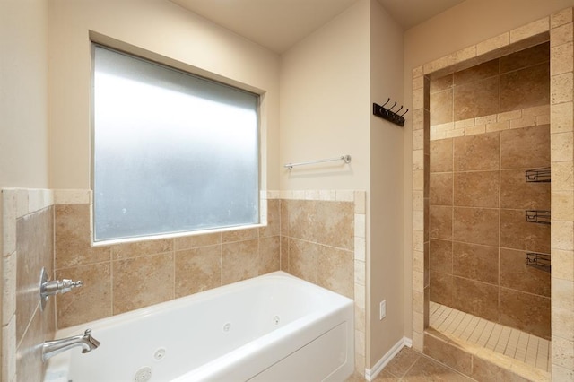 bathroom with shower with separate bathtub