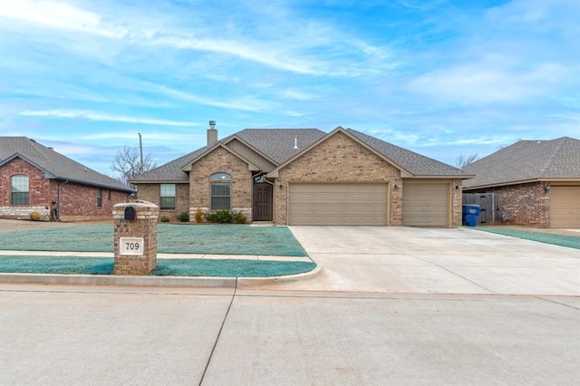 view of front of home with a garage