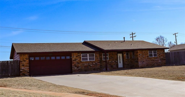 ranch-style home with a garage