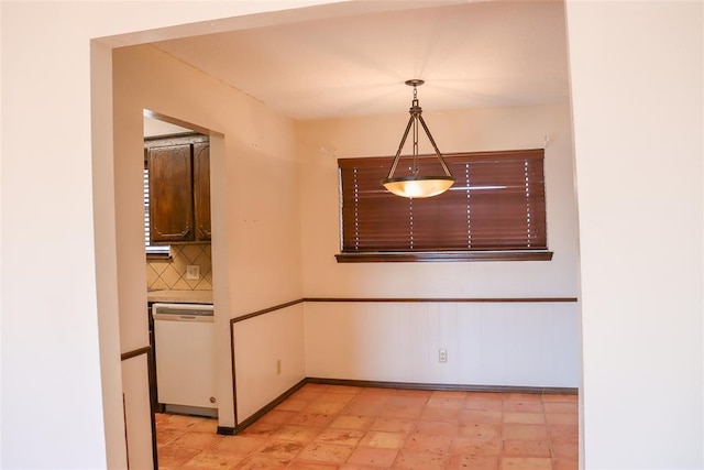 view of unfurnished dining area