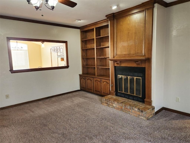 unfurnished living room featuring crown molding, a fireplace, carpet flooring, and baseboards