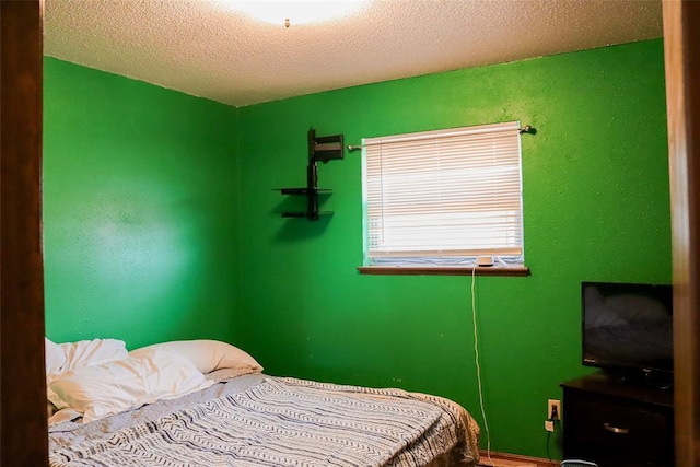 bedroom with a textured ceiling