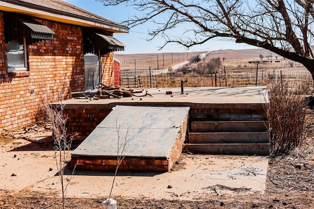 view of entry to storm shelter