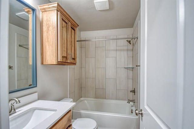 bathroom with vanity, bathing tub / shower combination, and toilet