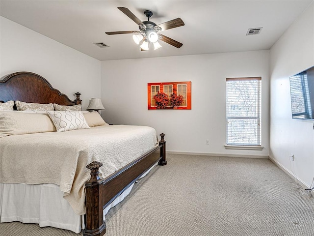 bedroom featuring baseboards, visible vents, and carpet flooring