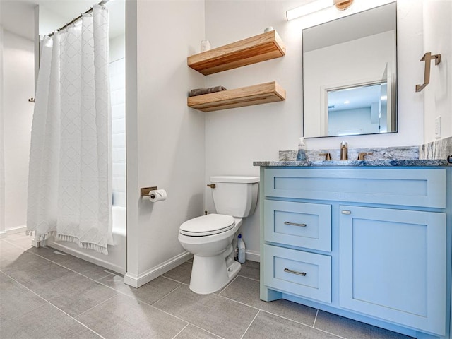 bathroom with toilet, shower / bath combo with shower curtain, vanity, tile patterned flooring, and baseboards