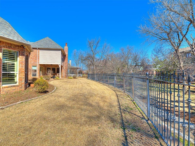 view of yard with fence