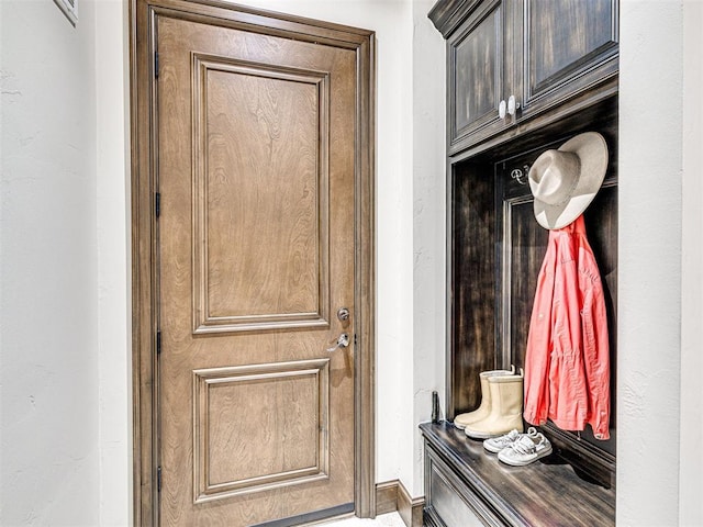 405 Flint Ridge Ct, Norman, OK 73072 - mudroom featuring baseboards