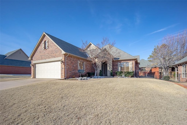 view of front property with a garage and a front lawn