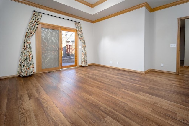 1601 Vandivort Pl, Edmond, OK 73034 - unfurnished room with wood finished floors, ornamental molding, and baseboards