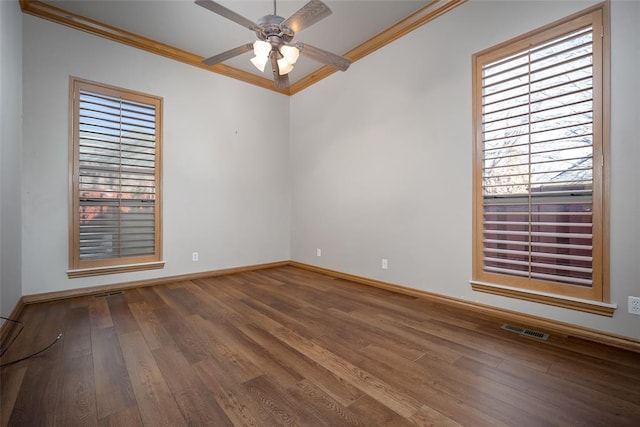 1601 Vandivort Pl, Edmond, OK 73034 - unfurnished room featuring ornamental molding, healthy amount of natural light, wood finished floors, ceiling fan, and baseboards