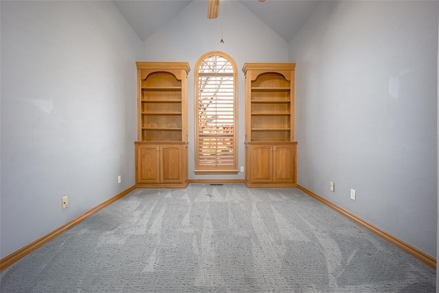 1601 Vandivort Pl, Edmond, OK 73034 - unfurnished room with a ceiling fan, light colored carpet, lofted ceiling, and baseboards