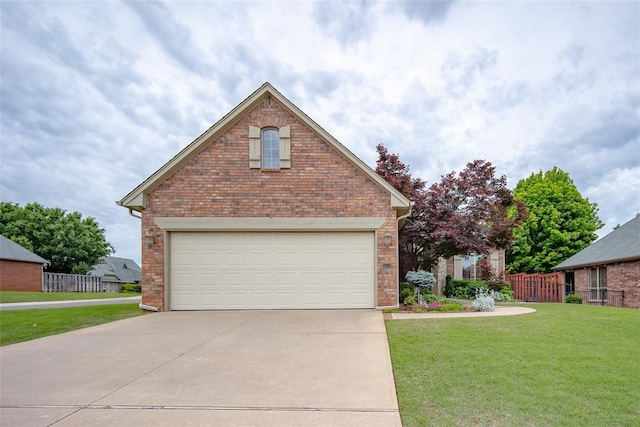 1601 Vandivort Pl, Edmond, OK 73034 - view of front of home with brick siding, driveway, and a garage