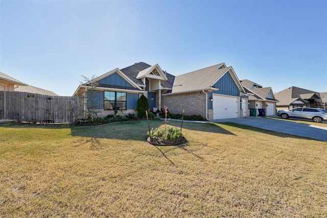 view of front facade with a front yard, fence, board and batten siding, and brick siding