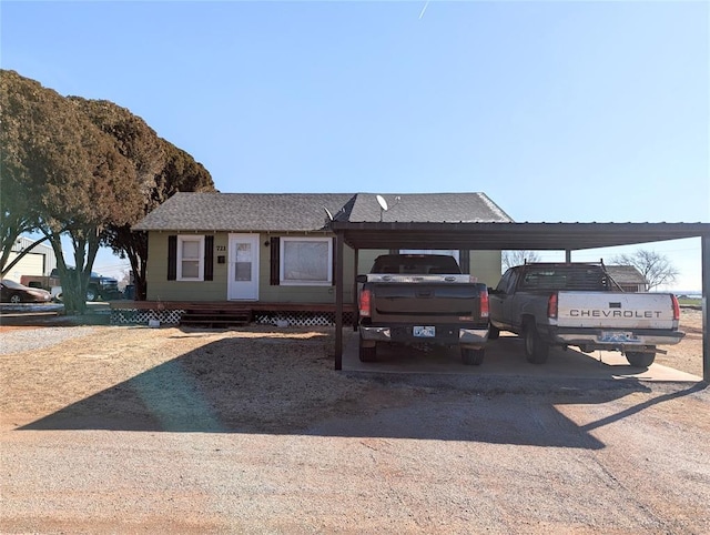 view of front of house featuring a carport