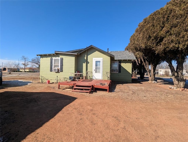 view of front of home with a wooden deck