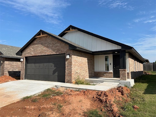 view of front of property with a garage