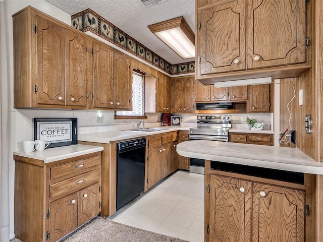 kitchen featuring under cabinet range hood, a sink, black dishwasher, stainless steel electric range, and brown cabinets