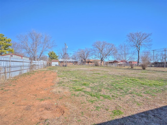 view of yard featuring fence