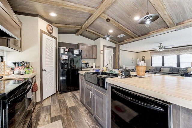 kitchen with vaulted ceiling with beams, black appliances, wood ceiling, and dark wood-style floors