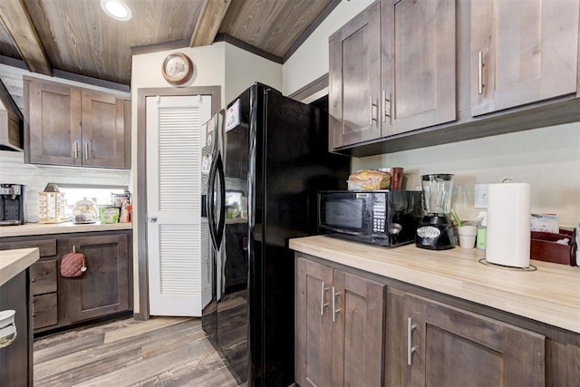 kitchen featuring light wood-style floors, recessed lighting, wood ceiling, and black appliances